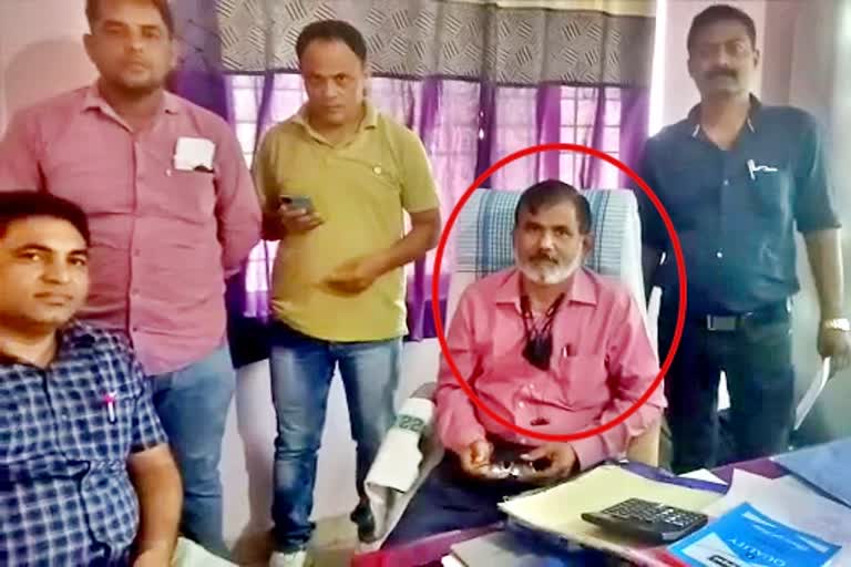 Manager arrested for taking bribe