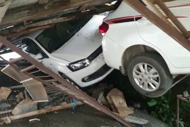 Two vehicles were badly damaged due to landslide in Dalhousie