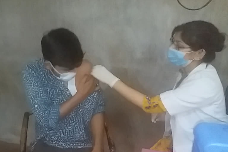 giving vaccination