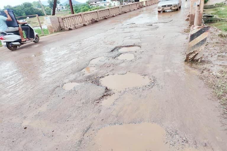 Potholes rain NH 30 road in Kanker