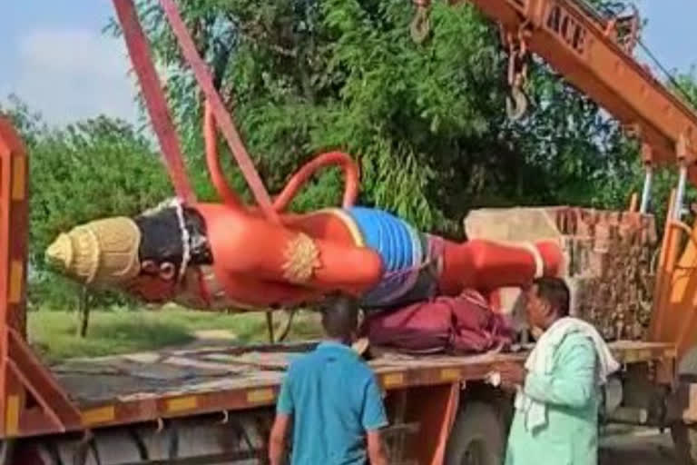 Bajrangbali idol lifted from crane