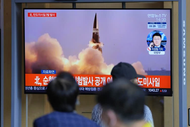 Rival Koreas test missiles