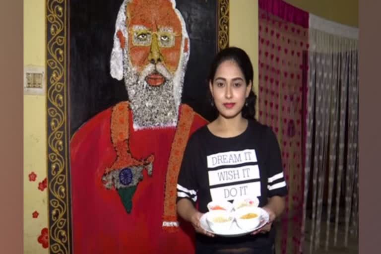 Odisha's artist crafts 8 ft long portrait of PM Modi using food grains on his birthday