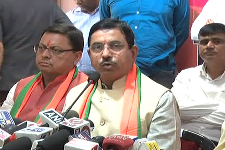 bjp-election-in-charge-prahlad-joshi-has-declared-pushkar-dhami-as-the-cm-face-for-the-next-election