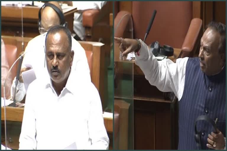 MLA Lingesh and Minister KS Eshwarappa talking in Assembly session