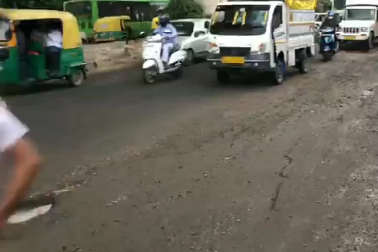 west delhi road in bad condition