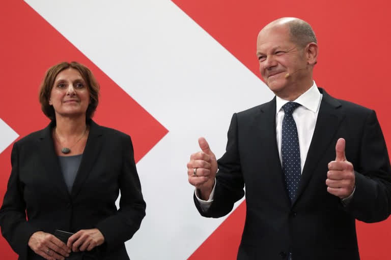Social Democrats narrowly beat Merkel's bloc in German vote