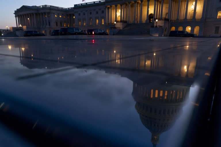 Biden signs bill to avert partial government shutdown