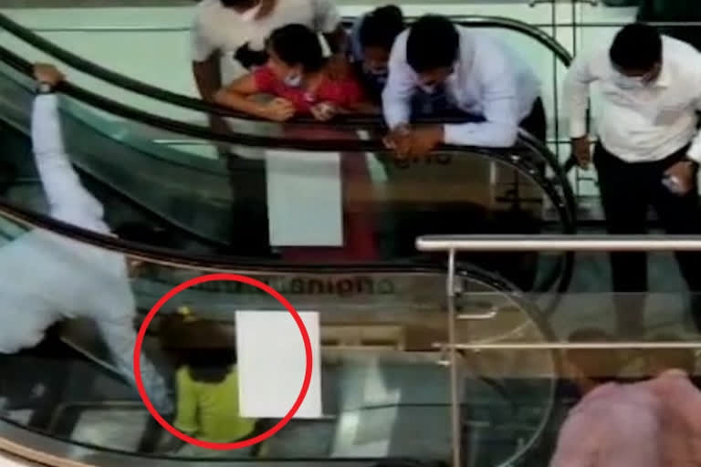 girl struck in escalator at maddilapalem