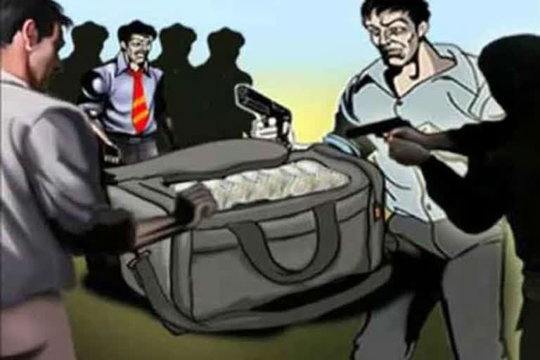 robbery at gunpoint in banswara