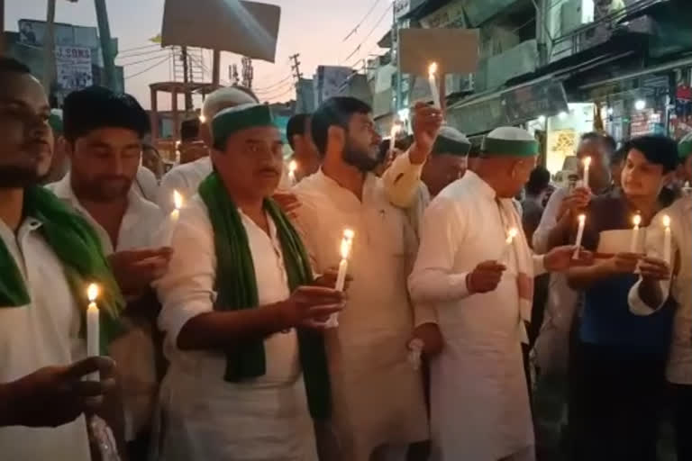 BJP पर गुंडों से किसानों की हत्या कराने का आरोप, BKU ने निकाला कैंडल मार्च