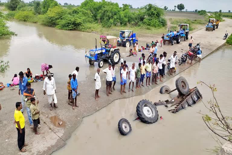 A tractor that rolled over into a stream