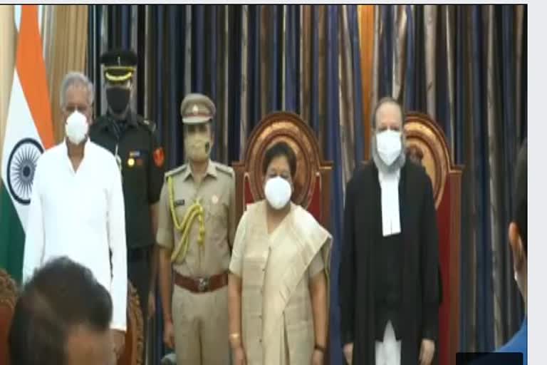 Judge and Chief Minister with Chief Governor present at the swearing-in ceremony