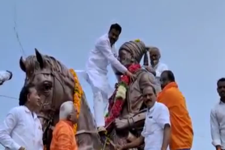 mla navghare stand on shivaji maharaj horse