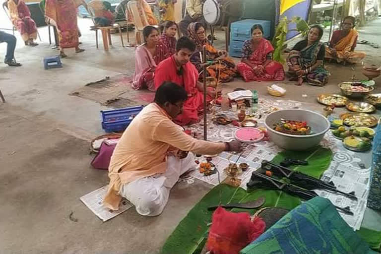 bjp mp from ranaghat jagannath sarkar allegedly worship government arms during durga puja