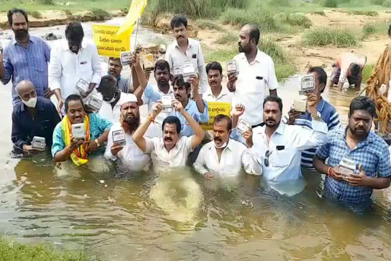 tdp leaders protest over raised power charges