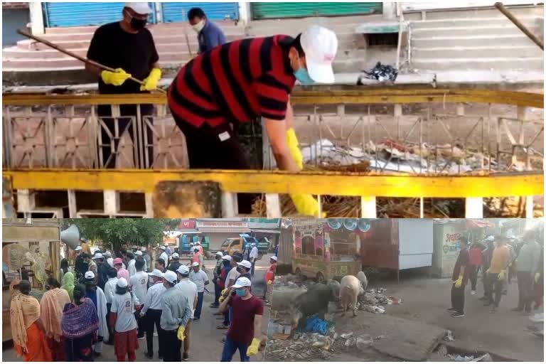 hoshangabad collectors came on road with a broom to clean city
