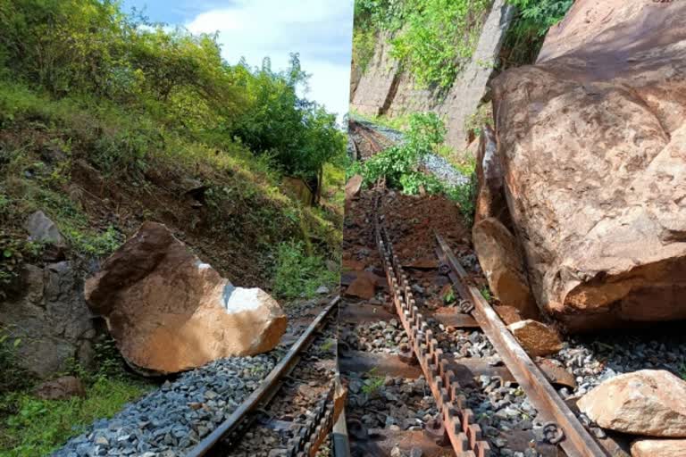 ரயில் பாதையில் விழுந்த பாறைகள்