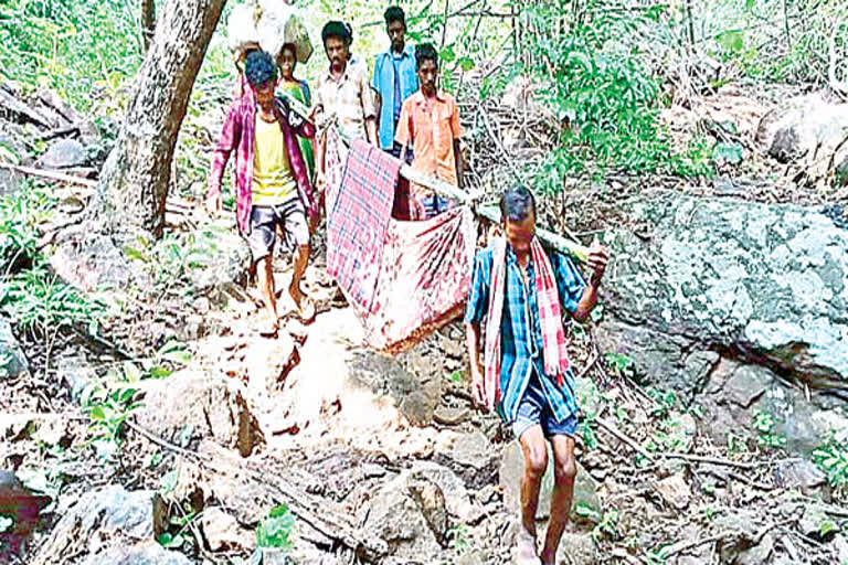 family-members-took-the-sick-man-in-a-doli-at-vishaka-district