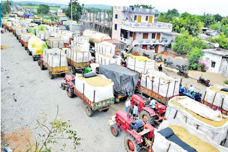 Farmers came on the road and protested that they were not buying grain in nalgonda district