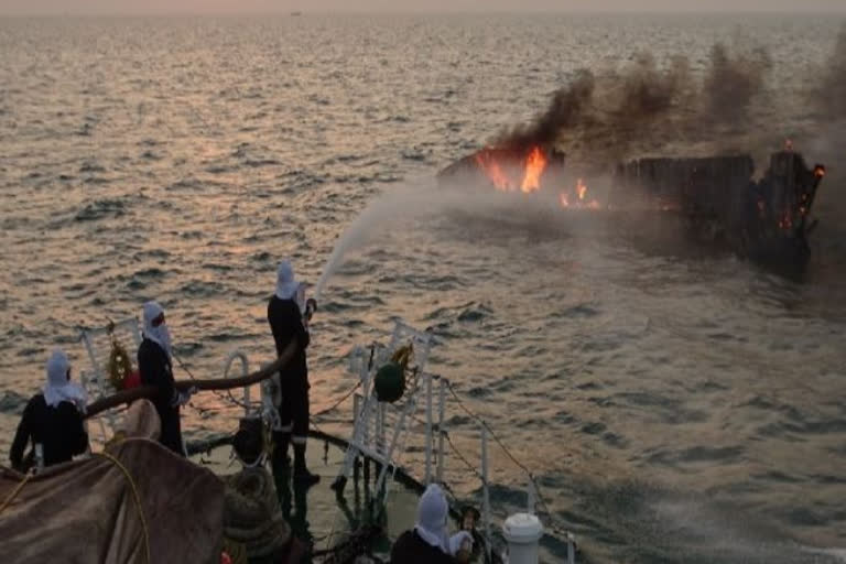 Coast Guard ship rescues 7 crew members  crew members of fishing boat rescued  fishing boat on fire off Gujarat coast  Coast Guard rescue off Gujarat coast