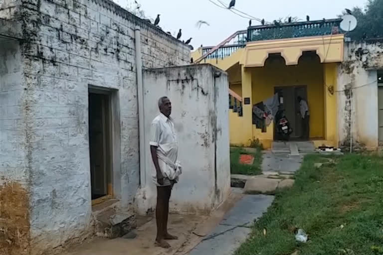 men feeding crows everyday in anantpuram district