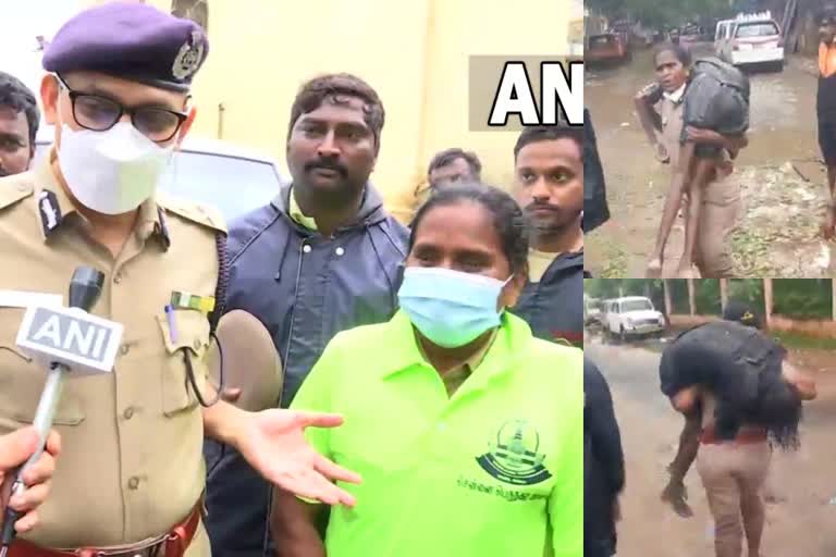 tamil rain police woman  tamilnadu rain woman police officer recuses youth life  യുവാവിനെ രക്ഷിച്ച് വനിത പൊലീസ് ഉദ്യോഗസ്ഥ  വനിത പൊലീസ് ഉദ്യോഗസ്ഥ  വീഡിയോ വൈറല്‍  തമിഴ്‌ നാട്‌ മഴ  തമിഴ്‌നാട്‌ മഴ കാഴ്‌ചകള്‍  ചെന്നൈ പൊലീസ്  പൊലീസ് ഉദ്യോഗസ്ഥയ്‌ക്ക് അഭിനന്ദന പ്രവാഹം  സമൂഹമാധ്യമത്തിലെ വൈറല്‍ വീഡിയോ  viral video  viral video in social media  tamilnadu rain  heavy rain in tamilnadu