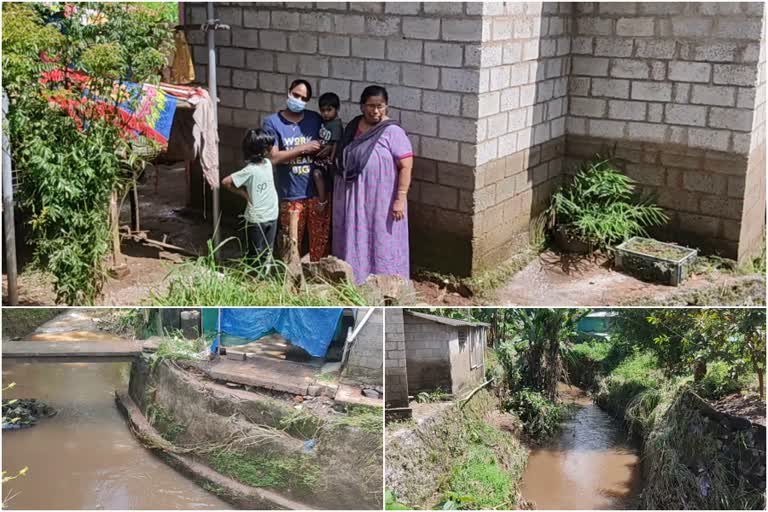 Rain water enters house  idukki rain water news  rain water enter house idukki  books lost in rain water in idukki  തോട്ടിൽ നിന്ന് വീട്ടിൽ വെള്ളം കയറി  മഴവെള്ളം വീട്ടിൽ കയറുന്നു  വീടിനുള്ളിൽ മഴവെള്ളം  തോട്ടിനുള്ളിൽ വീട്ടിലേക്ക് വള്ളം കയറുന്നു