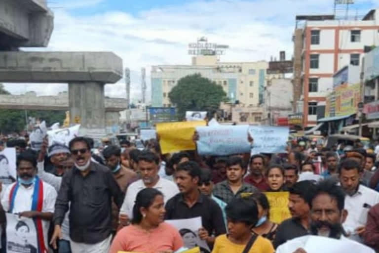 Student's funeral procession with slogans of justice