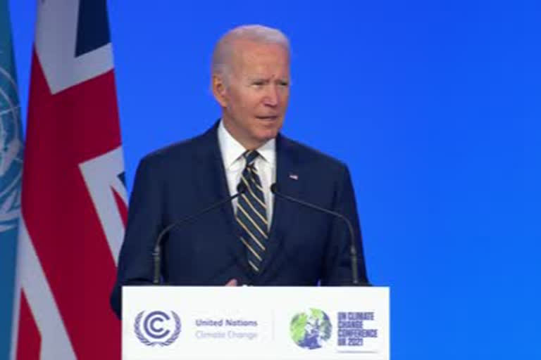 Biden signs $1T infrastructure bill with bipartisan audience