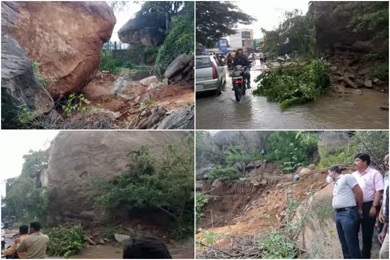 Huge rock topples down the road