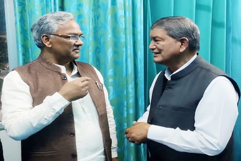 cm-trivendra-singh-rawat-met-harish-rawat