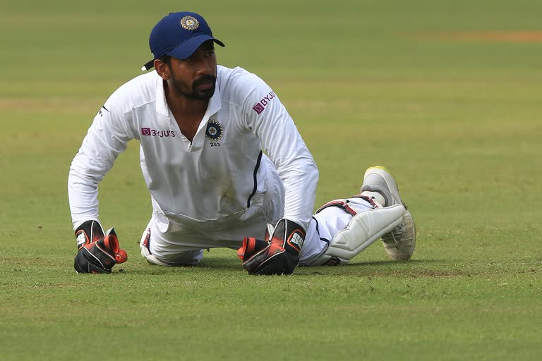 Wriddhiman Saha out  Saha injury  Saha out with stiff neck issue  INDvsNZ test  വൃദ്ധിമാൻ സാഹക്ക് പരിക്ക്  സാഹക്ക് കഴുത്തിന് പരിക്ക്  ശ്രീകർ ഭരത് ഇന്ത്യയുടെ വിക്കറ്റ് കാക്കുന്നു