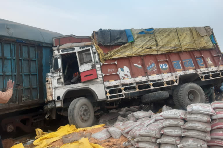 Truck collides with train