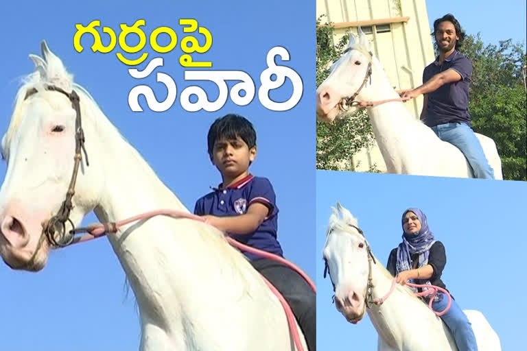 Azgarh family rides a horse