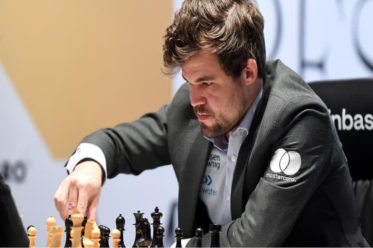 Magnus Carlsen retains World Chess Championship title  Magnus Carlsen beat Ian Nepomniachtchi  മാഗ്നസ് കാൾസന്‍  യാൻ നീപോംനീഷി  ലോക ചെസ്‌ ചാമ്പ്യന്‍ഷിപ്പ് കിരീടം മാഗ്നസ് കാൾസന്