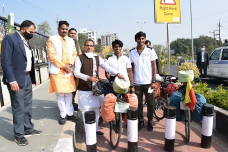 Two youths from Karnataka, Dhanush and Hemant, will travel 24000 km by bicycle to bring awareness to global warming