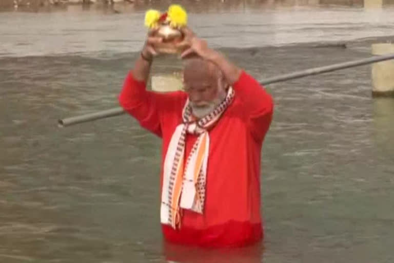 pm narendra modi takes a holy dip in ganga before inaugurating kashi viswanath dham