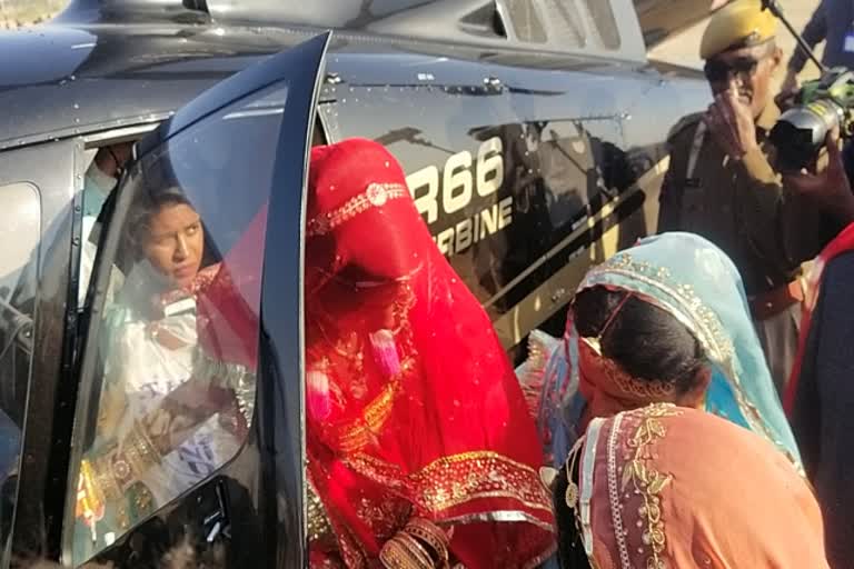 Bride arrives by helicopter in Badmer