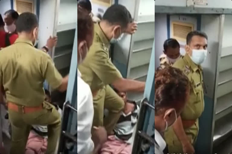 Policeman kicked train passenger