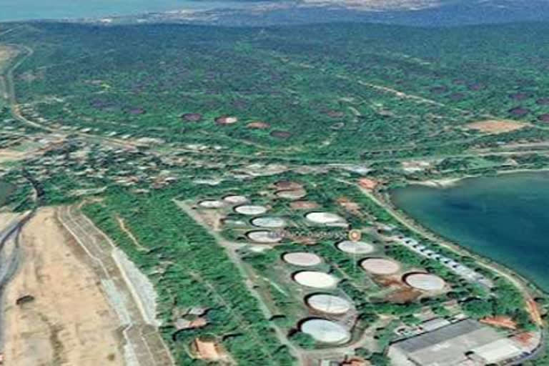 Sri Lanka has agreed to implement a joint project with India to redevelop the strategic World War II-era oil tank farm in the eastern port district of Trincomalee, the island nation's government announced here on Tuesday.