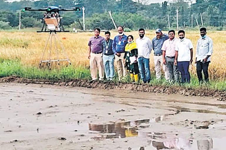 Sowing seeds with Drone in Farming, jayashankar varsity scientists