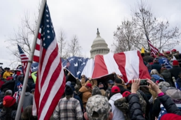 US AG vows to hold all Capitol riot 'perpetrators' accountable