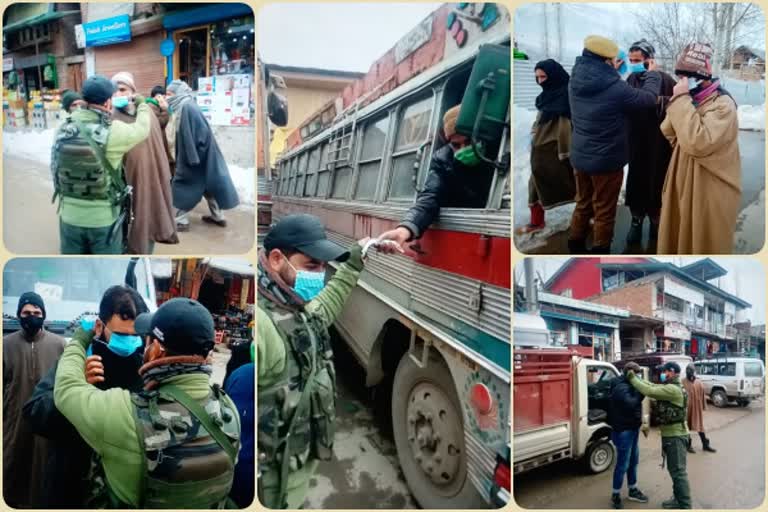 in-view-of-corona-third-wave-budgam-police-distributed-free-masks-indifferent-areas-in-budgam