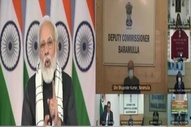 pm virtually  interact with dms of various districts