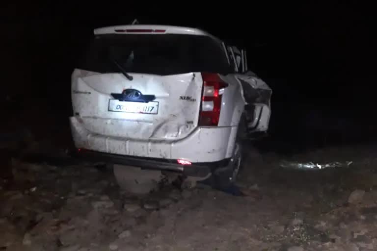 car falls under bridge