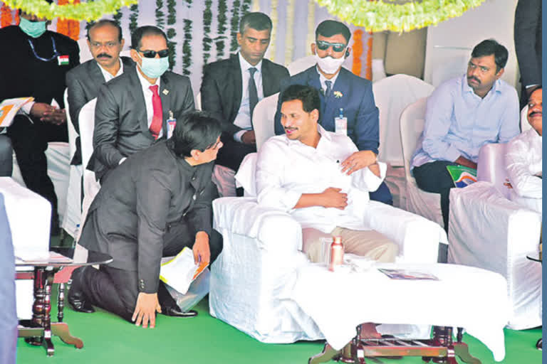 IAS Praveen Prakash sit on knees