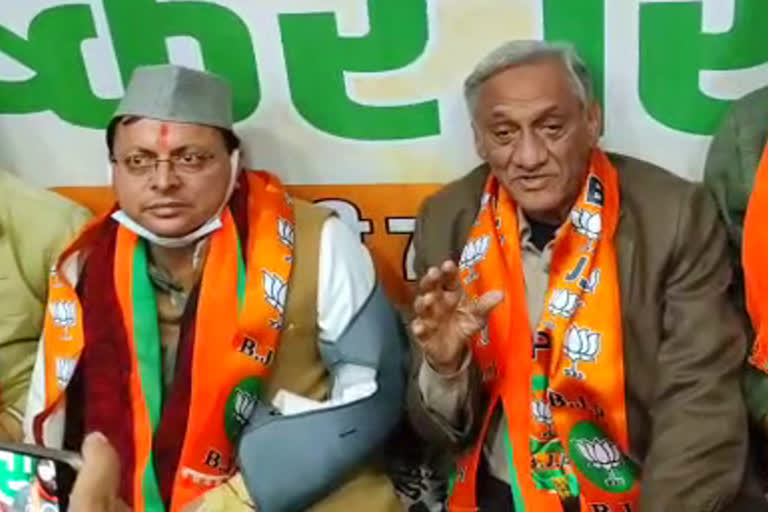 Vijay Bahuguna and CM Dhami