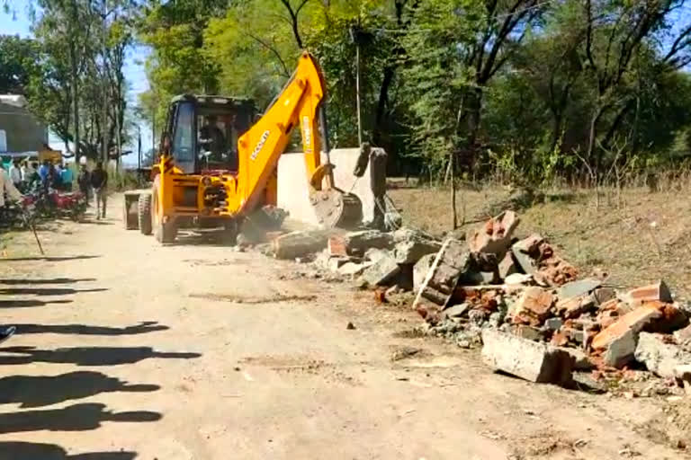 Cemetery wall made by minister demolished