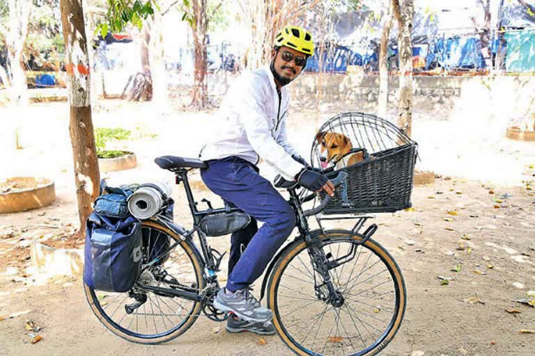 young cyclist Adventure trip to the China border with his puppy